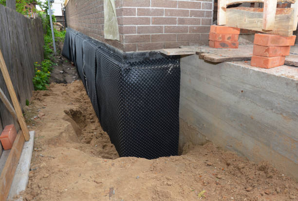 SJ Waterproofing Pros technician performing targeted Waterproofing assessment in Ontario, OR
